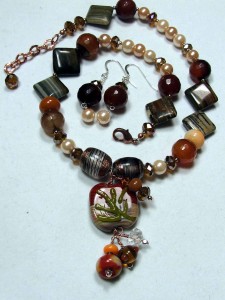 lampwork focal with eclectic bead necklace and matching earrings