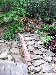 Pond from deck - wall up with stones 2