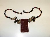 Jewelry_clay_pendant_with_tiger_coral