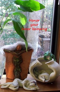 Photo of window altar with words: honor your inner knowing. Follow your heart