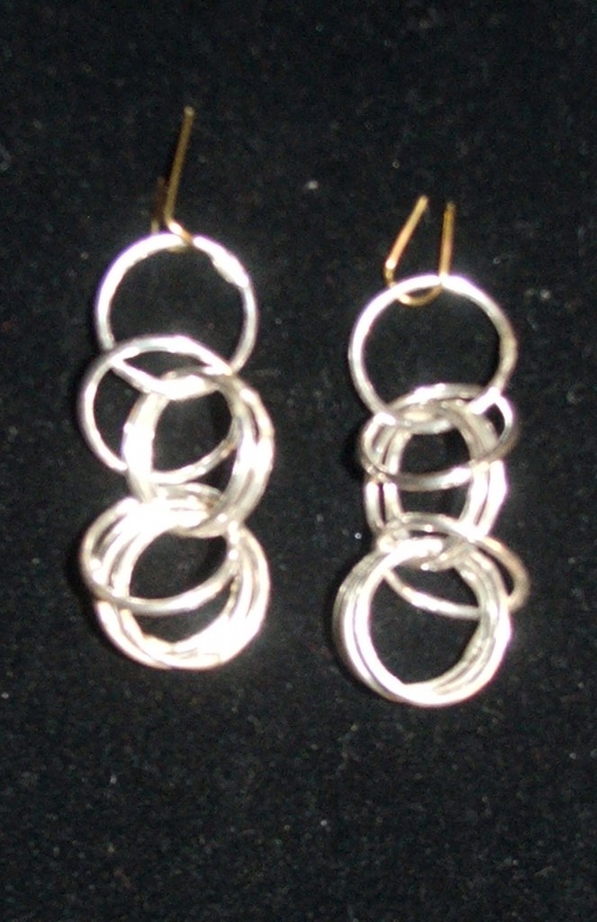 Earrings - the body is fine silver.  Handmade ear wires and eclectic bangles to come.  By Tammy Vitale.