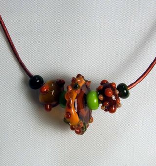 8.09 corded lampwork 7 bds autumn with chartreuse $35
